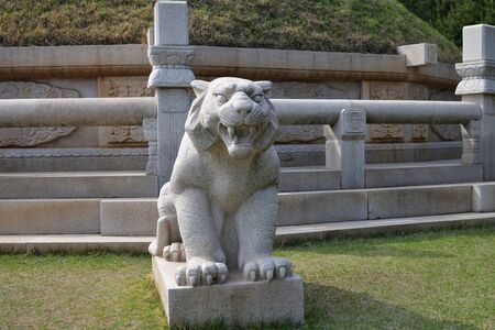 Kaesong, North Korea - May 5, 2019: Granite lion sculpture near Tomb of King Wanggon the founder of the Koryo dynasty. Modern replicaのeditorial素材