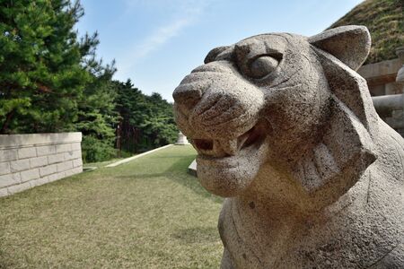 Kaesong, North Korea - May 5, 2019: Granite lion sculpture near Tomb of King Wanggon the founder of the Koryo dynasty. Modern replicaのeditorial素材