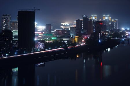 Pyongyang, North Korea - May 2, 2019: Night view on the modern residential complex and skyline. View from Yanggakdo islandのeditorial素材