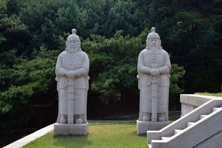 Kaesong, North Korea - May 5, 2019: Ancient stone guards sculpture near Tomb of King Wanggon the founder of the Koryo dynasty. Modern replicaのeditorial素材