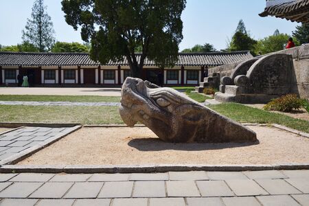 Kaesong, North Korea - May 4, 2019: Ancient stone dragon sculpture in Confucian educational facility of the Koryo dynasty. It opened in 992のeditorial素材