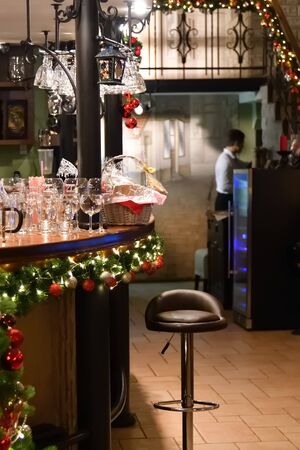 Voronezh, Russia - January 06, 2019: Restaurant interior, bar counter with Christmas decorations. Christmas nightのeditorial素材