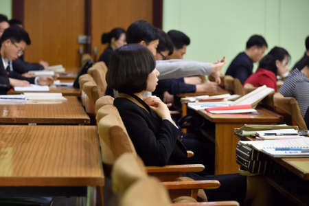 Pyongyang, North Korea - April  29, 2019: Students in the classroom of the Great People's Study Houseのeditorial素材