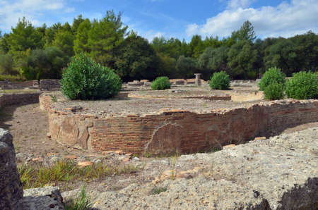 Olympia, Greece - Oct 5, 2013: Ancient ruins shown in Olympia. Birthplace of the olympic games, now UNESCO world heritage site and place where ignite the fire of modern Olympic Gamesのeditorial素材