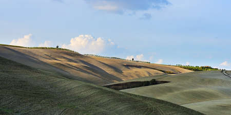 Idyllic rural Tuscan landscape with plowed field at autumn Italy, Europeの写真素材