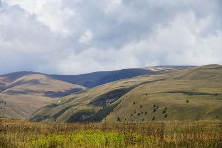 Caucasus alpine meadow and mountains landscape in Chechnya, Russia. Vedeno district of the Chechen Republicの写真素材