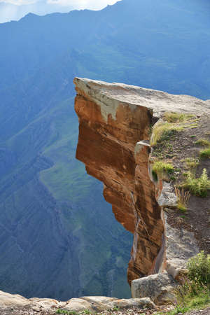 Panoramic view of the mountain valley. Dagestan scenery. Ledges of rocks near the village of Goor in Dagestan, Russia. landscape with a cliffの写真素材
