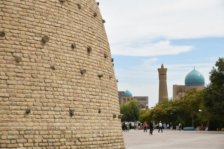 View on Poi Kalyan complex and the Ark of Bukhara is a massive fortress located in the city of Bukhara, Uzbekistan. It was initially built and occupied around the 5th century ADの写真素材