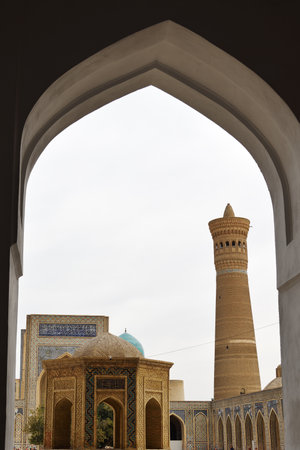 Inside the Kalon mosque, view from arch on square and minaretの写真素材