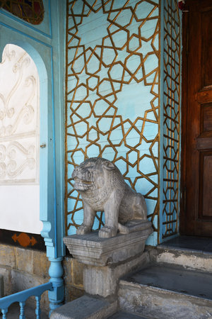 Stone lion sculpture at entrance to Sitorai Mokhi-Khosa Palace is also known as the Last Emir's Palace or Palace Under the Moon and Stars in Bukhara. Uzbekistanの写真素材