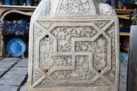 Harem in khan palace also known as Tosh Hovli or Tash Khauli Palace. Ancient symbol of the sun on the base of the column. Uzbekistanの写真素材