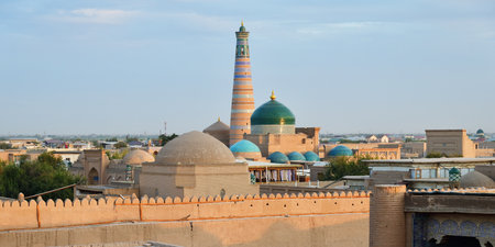Cityscape in Ichan Kala at sunset time, ancient inner town of the old city Khiva in Khorezm region, Khiva, Uzbekistanの写真素材