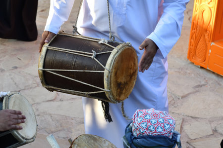 A traditional Omani daf drum played by a street musician. Sultanate of Oman