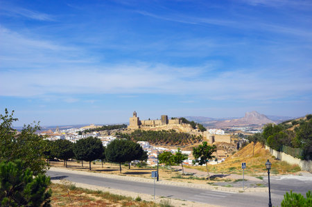 Alcazaba viewpoint, Antequera. The tower on the left is the Torre de Homenaje. To the right below the Alcazaba hill is the Ermita de la Virgen de la Espera, or Puerta de Malagaの写真素材