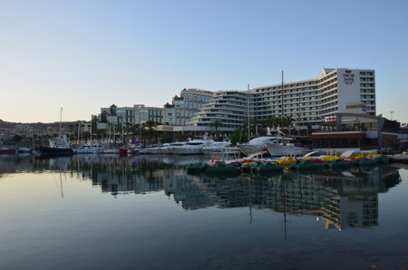 Eilat, Israel - March 31, 2015: Crowne Plaza hotel in Eilat city shown at sunset time, famous...