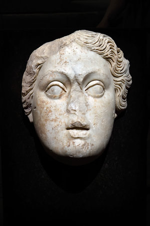 Istanbul, Turkey - December 10, 2023: Museum of Archeology in Istanbul. Ancient marble relief of a woman head from Side, dating to the early 2nd century CEのeditorial素材
