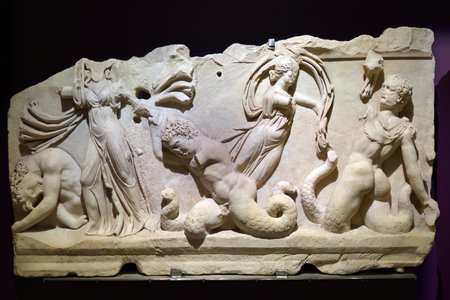Istanbul, Turkey - December 10, 2023: Archaeology Museum. Mythical battle between  Olympian gods and...