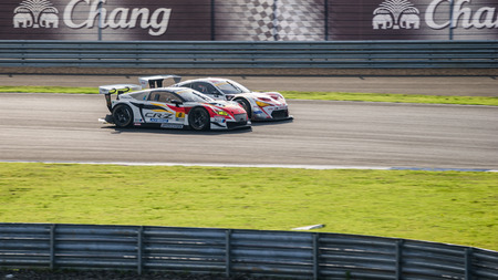 BURIRUM, THAILAND - OCTOBER 5 : Races at 2014 AUTOBACS SUPER GT Round7 BURIRAM UNITED SUPER GT RACE on October 5, 2014 in Burirum, Thailand.のeditorial素材
