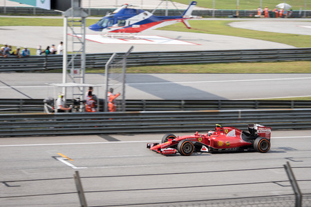 SEPANG  MARCH 28: Kimi Rikknen of Scuderia Ferrari at 2015 Formula 1 Petronas Malaysia Grand Prix Qualifying Session at Sepang circuit on March 28 2015 in Sepang Malaysia.のeditorial素材