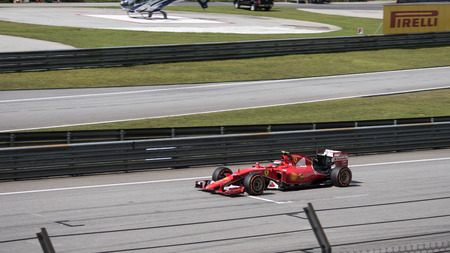 SEPANG  MARCH 29: Kimi Raikkonen of Scuderia Ferrari at 2015 Formula 1 Petronas Malaysia Grand Prix Race Day at Sepang circuit on March 29 2015 in Sepang Malaysia.のeditorial素材