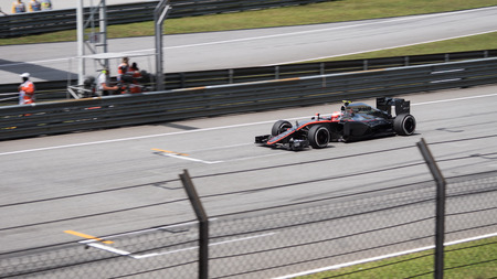 SEPANG  MARCH 29: Jenson Button of McLaren Honda at 2015 Formula 1 Petronas Malaysia Grand Prix Race Day at Sepang circuit on March 29 2015 in Sepang Malaysia.のeditorial素材