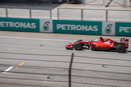 SEPANG  MARCH 29: Sebastian Vettel of Scuderia Ferrari at 2015 Formula 1 Petronas Malaysia Grand Prix Race Day at Sepang circuit on March 29 2015 in Sepang Malaysia.のeditorial素材