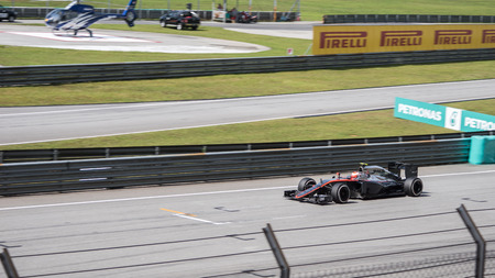 SEPANG  MARCH 29: Jenson Button of McLaren Honda at 2015 Formula 1 Petronas Malaysia Grand Prix Race Day at Sepang circuit on March 29 2015 in Sepang Malaysia.のeditorial素材
