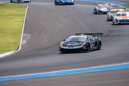 BURIRUM, THAILAND - JUNE 21 : Takayuki Aoki of JLOC in Super GT Final Race Warm Up Lap at 2015 AUTOBACS SUPER GT Round 3 BURIRAM SUPER GT RACE on June 21, 2015 in Burirum, Thailand.のeditorial素材