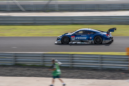 BURIRUM, THAILAND - JUNE 21 : Hideki Mutoh of KEIHIN REAL RACING in Super GT Final Race 66 Laps at 2015 AUTOBACS SUPER GT Round 3 BURIRAM SUPER GT RACE on June 21, 2015 in Burirum, Thailand.のeditorial素材