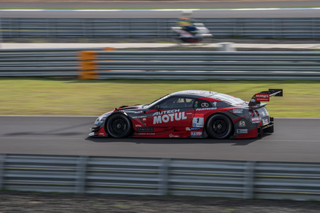 BURIRUM, THAILAND - JUNE 21 : Ronnie Quintarelli of NISMO in Super GT Final Race 66 Laps at 2015 AUTOBACS SUPER GT Round 3 BURIRAM SUPER GT RACE on June 21, 2015 in Burirum, Thailand.のeditorial素材