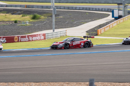 BURIRUM, THAILAND - JUNE 21 : Tsugio Matsuda of NISMO in Super GT Final Race 66 Laps at 2015 AUTOBACS SUPER GT Round 3 BURIRAM SUPER GT RACE on June 21, 2015 in Burirum, Thailand.のeditorial素材