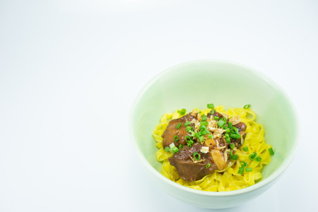 Noodle pour Poached pork spareribs with honeyの写真素材