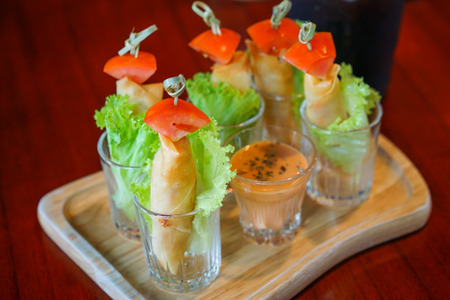 Deep fried shrimp spring rolls in glass smallの写真素材
