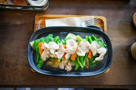 Fried noodle topped with porkの写真素材