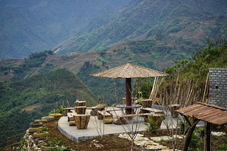 A garden pavilion with a beautiful view of the mountainsの写真素材