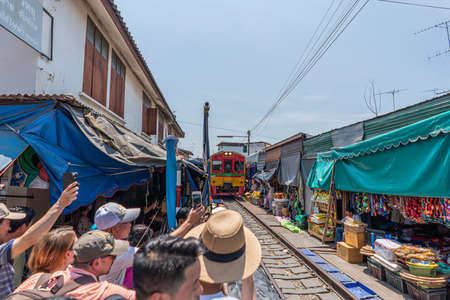 Samut Songkhram, Thailand - April,23,2019 : Merchent in Market on the Railway Track , Maeklong...