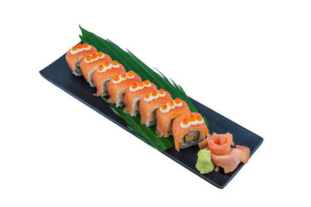 Salmon roll with salmon, smoked eel, avocado, cream cheese on black background. Sushi menu - Japanese Food Style on White Backgroundの写真素材