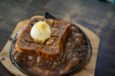 Hot Chocolate Honey Toast with icecream serve on hot panの写真素材