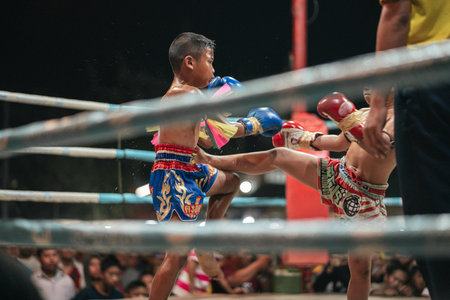 Nakhon Ratchasima, Thailand - February 01, 2020  : Unidentified players fighting Muaythai in Temple call "Muay wat" on February 01 , 2020 at Nong Yangam temple ,Nakhon Ratchasima Thailandのeditorial素材