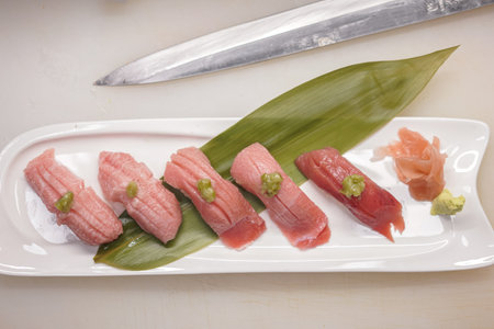 Akami Chutoro Otoro . Various type of blufin tuna sushi in japanese restaurant, before serving with japan knifeの写真素材