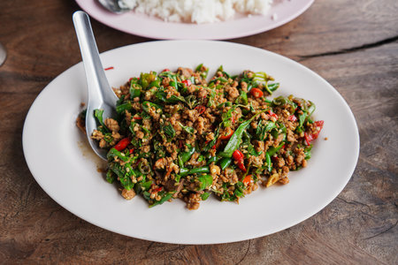 Stir fried Thai basil with minced pork and chilli and riceの写真素材