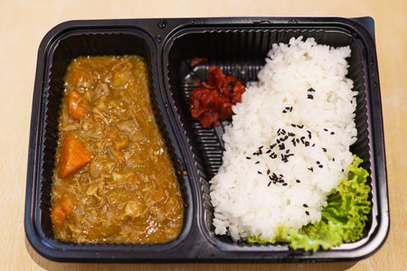 Boxed japanese curry rice. ready to eat and take away.の写真素材