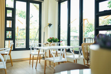 Interior of cafe restaurant slective focus table and chairs.の写真素材