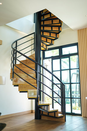Spiral wooden staircase circular staircase decoration interior.の写真素材