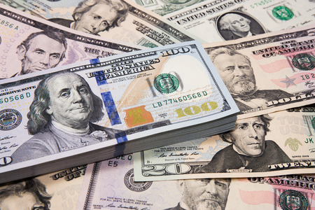 Money background of one new hundred dollars 