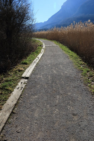 path along the Piano Lake in valley Menaggioの写真素材