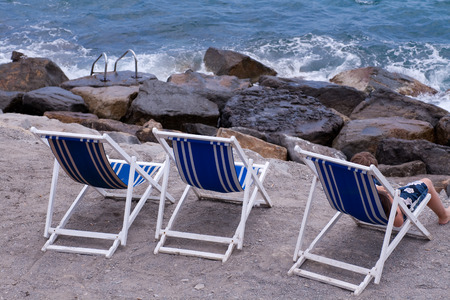 deck chairs on the cliffs of San Remoの写真素材