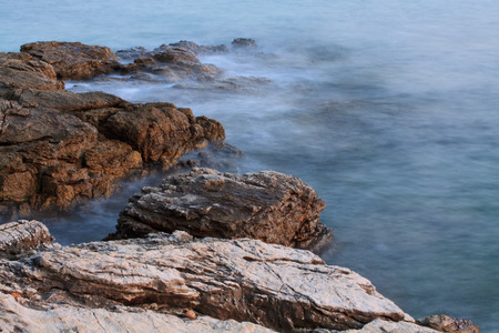 waves on the rocksの写真素材
