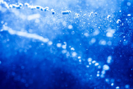 Abstract Blue bokeh defocus glitter blur background.