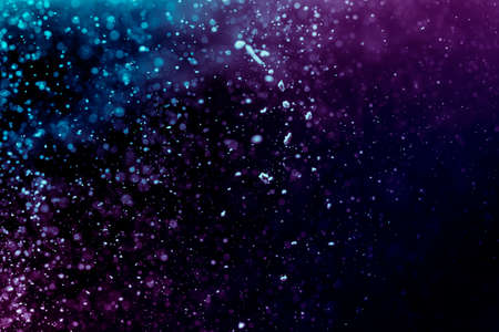 Abstract Purple bokeh defocus glitter blur background.